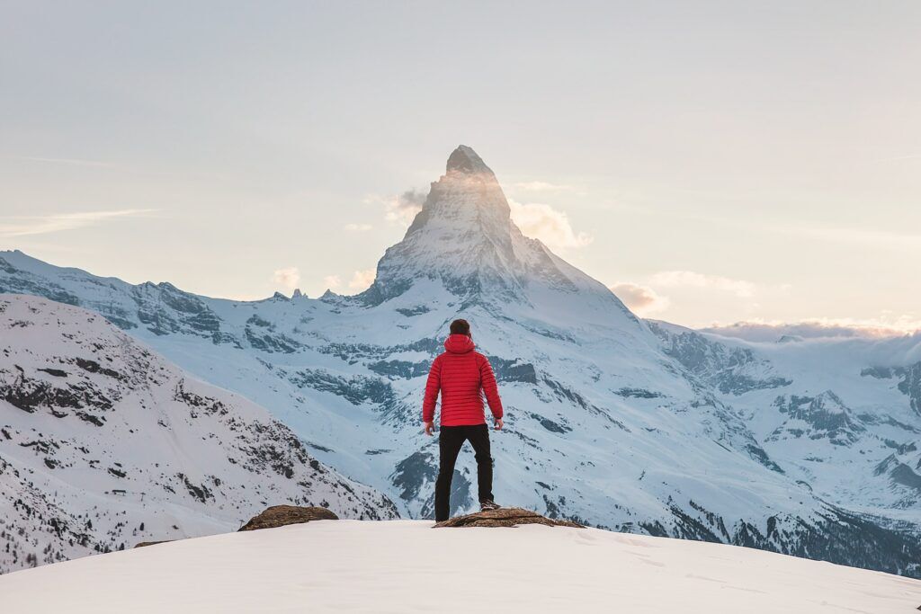 man staring at mountain